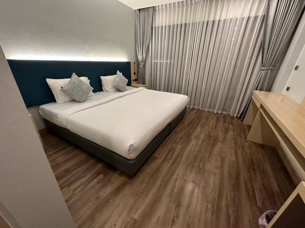 Postel nebo postele na pokoji v ubytování Baan Yuree Resort & Spa - SHA Plus