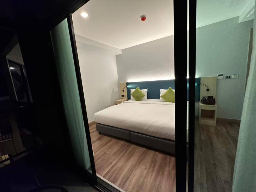 Postel nebo postele na pokoji v ubytování Baan Yuree Resort & Spa - SHA Plus