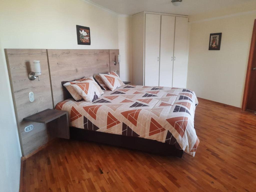 Postel nebo postele na pokoji v ubytování Hotel Rincon Aleman