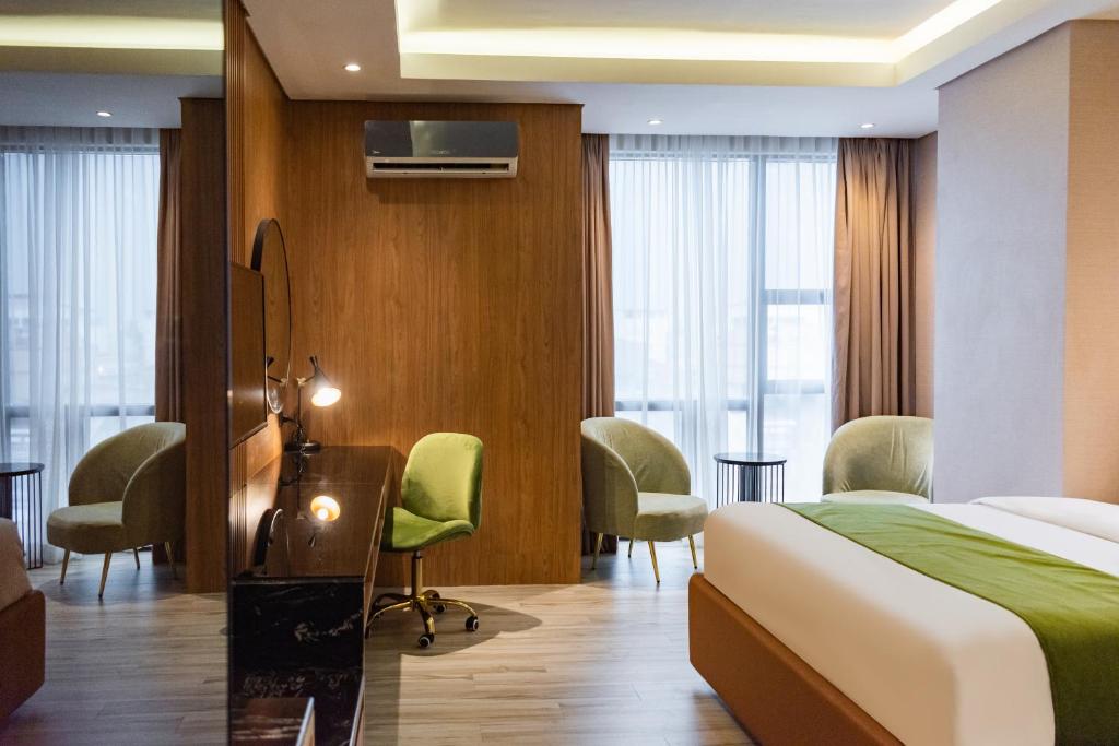 Voodi või voodid majutusasutuse Ironwood Hotel toas