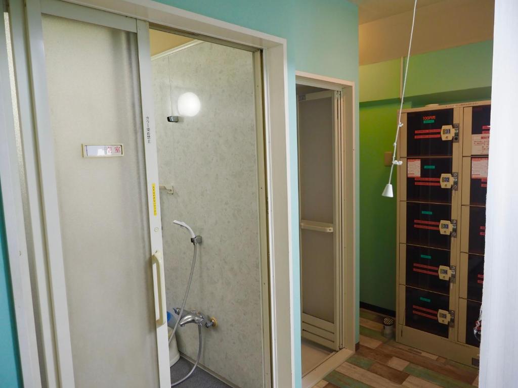 Koupelna v ubytování Capsule Hotel Block Room