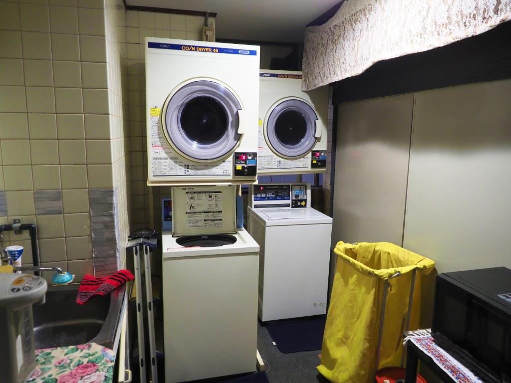 Kuchyň nebo kuchyňský kout v ubytování Capsule Hotel Block Room