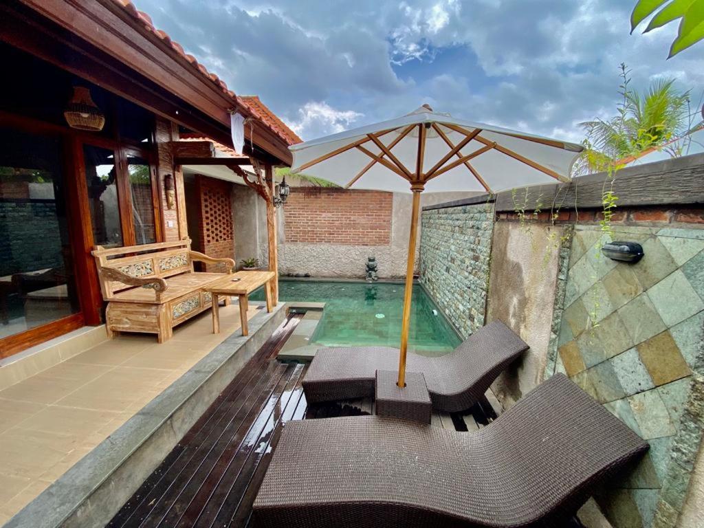 Bazén v ubytování Sridewi Villas Ubud nebo v jeho okolí