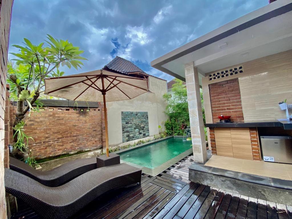 Bazén v ubytování Sridewi Villas Ubud nebo v jeho okolí