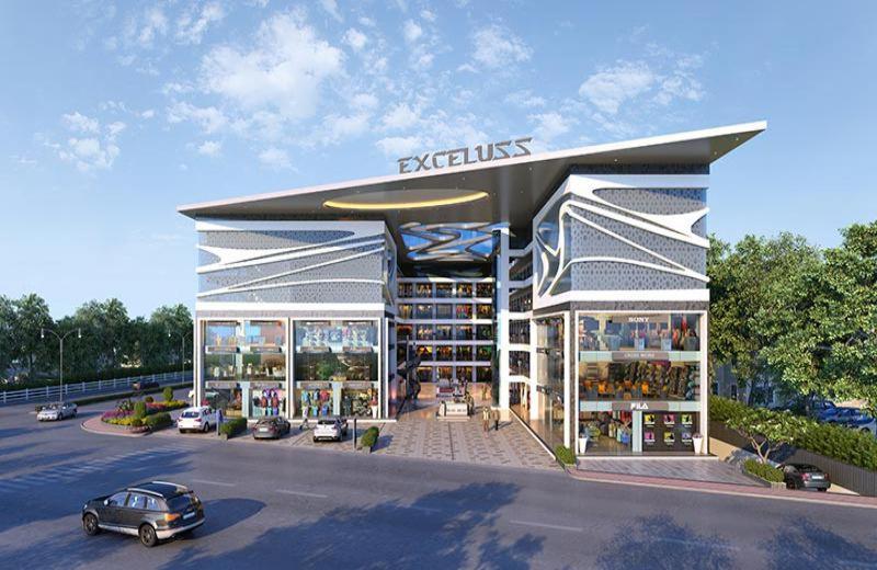 a rendering of a book store with a car parked in front at Hotel Silver in Surat