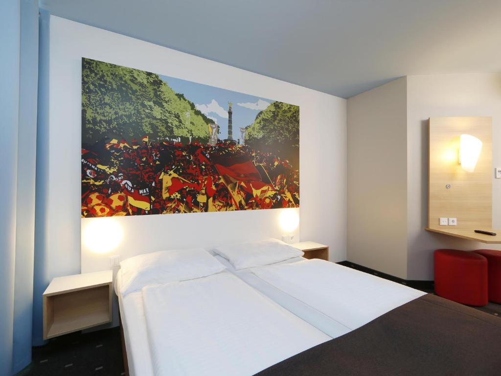 Postel nebo postele na pokoji v ubytování B&B Hotel Berlin-Tiergarten