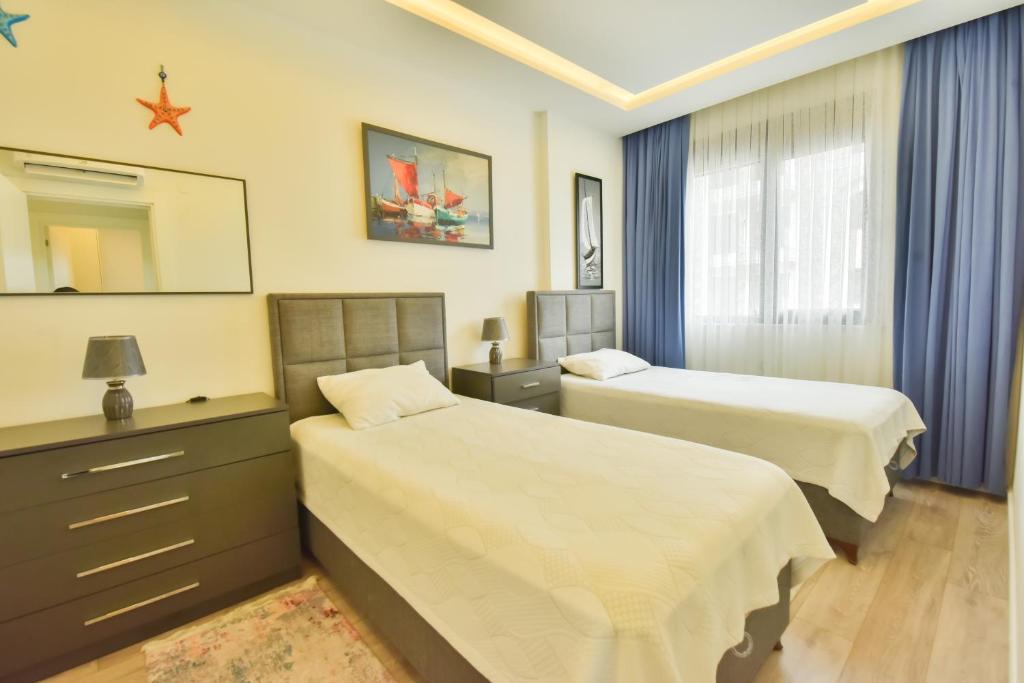 Postel nebo postele na pokoji v ubytování Апартаменты Best Home 26 Cleopatra Legacy No 8