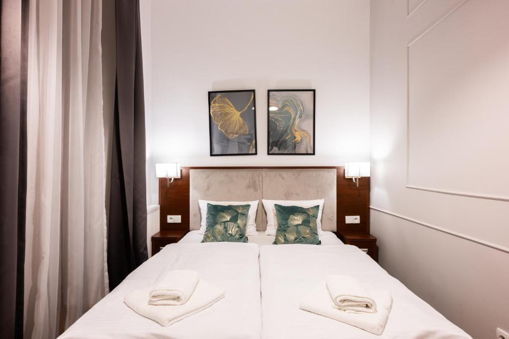 Postel nebo postele na pokoji v ubytování ON/SET APARTHOTEL