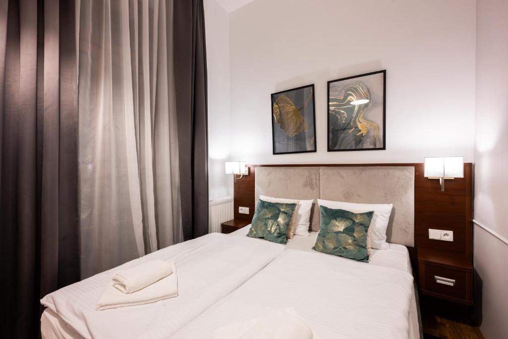 Postel nebo postele na pokoji v ubytování ON/SET APARTHOTEL