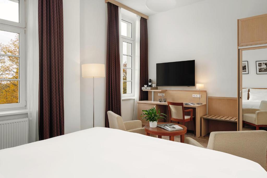 TV a/nebo společenská místnost v ubytování Harvey Spa Hotel
