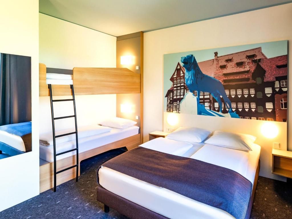 Postel nebo postele na pokoji v ubytování B&B Hotel Braunschweig-City