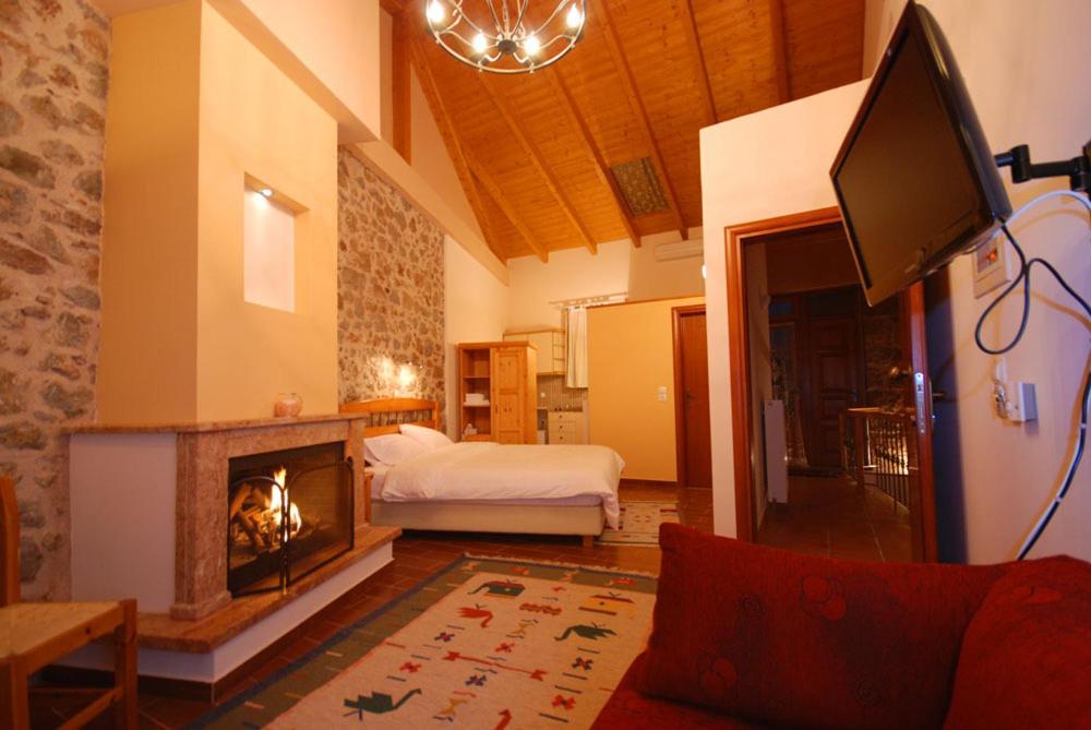 Tempat tidur dalam kamar di Hotel Parnassos