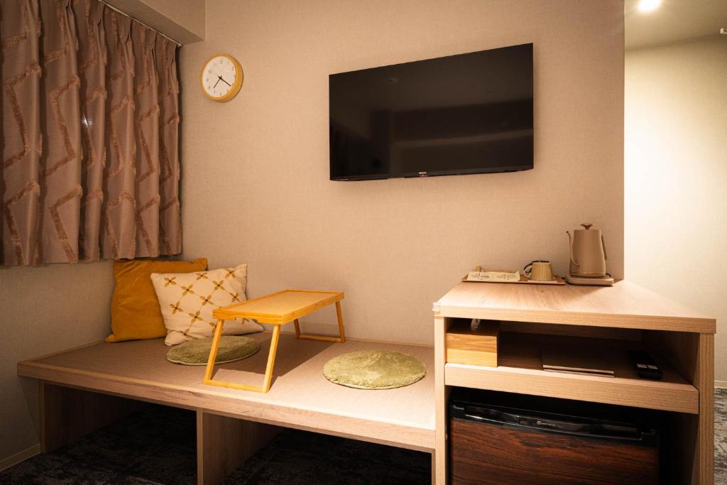 TV a/nebo společenská místnost v ubytování R Hotel Namba South