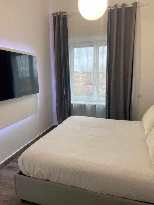 Postel nebo postele na pokoji v ubytování Residenza da Mimi