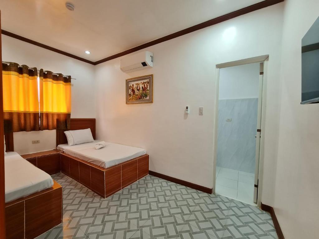 Postel nebo postele na pokoji v ubytování Alona Rose Hotel by SMS Hospitality