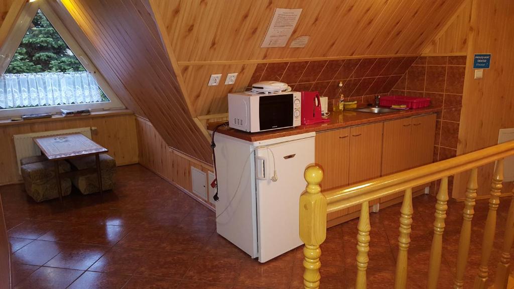 Kuchyňa alebo kuchynka v ubytovaní Willa Józefina