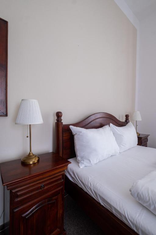 Postel nebo postele na pokoji v ubytování Zámecký Hotel ANTON FLORIAN