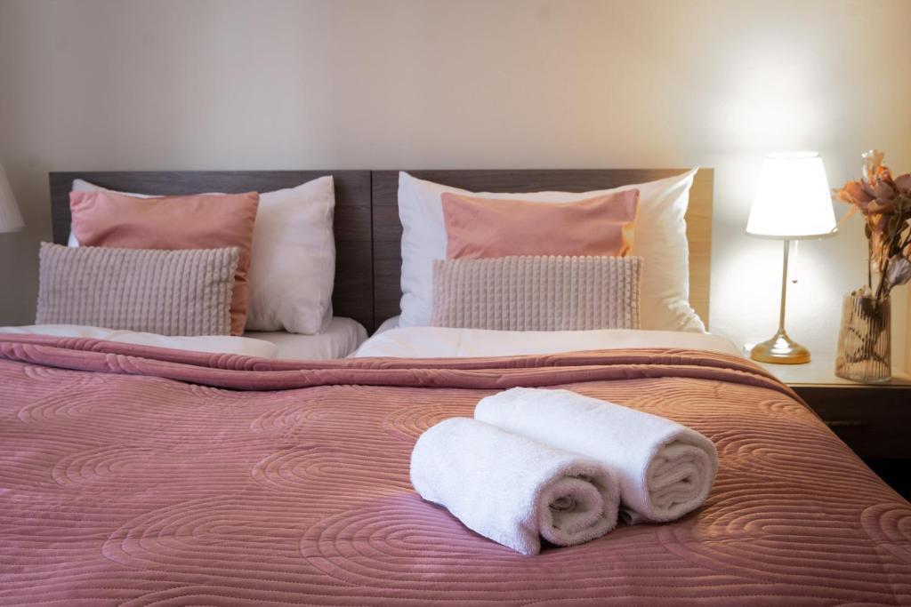 Postel nebo postele na pokoji v ubytování Zámecký Hotel ANTON FLORIAN