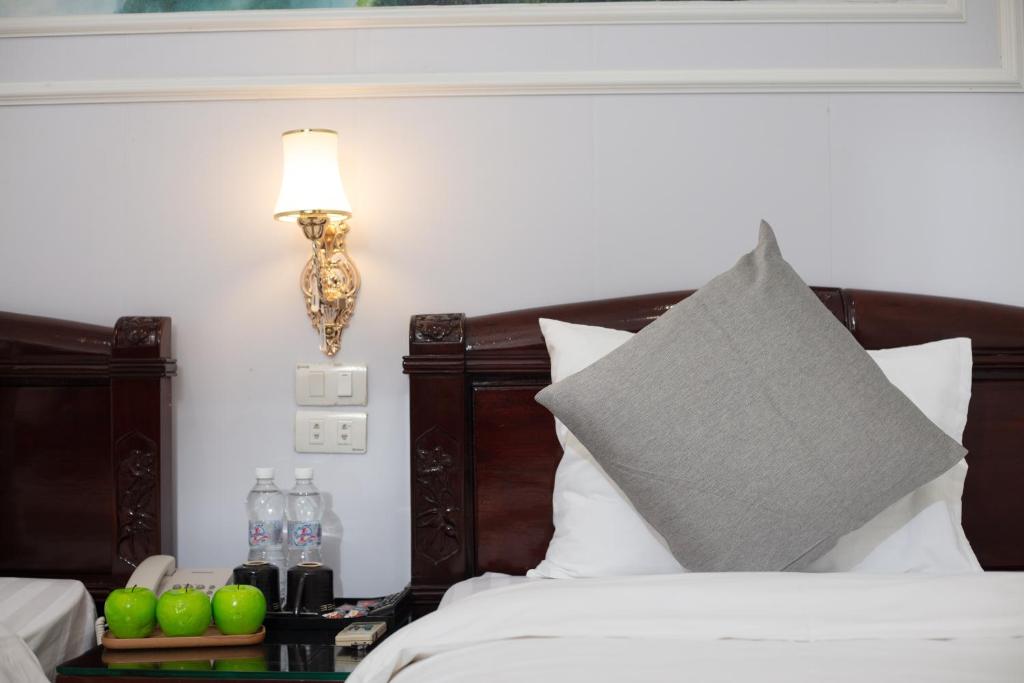 Postel nebo postele na pokoji v ubytování La Lisa Hotel