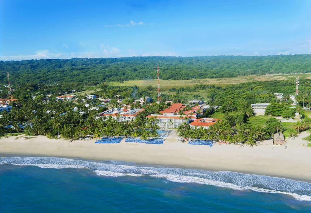 an aerial view of a resort on the beach at Viva Tangerine by Wyndham, A Trademark All Inclusive in Cabarete