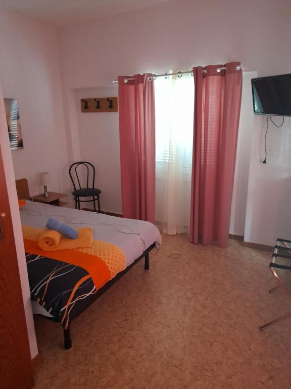 Postel nebo postele na pokoji v ubytování Garni Elisabetta
