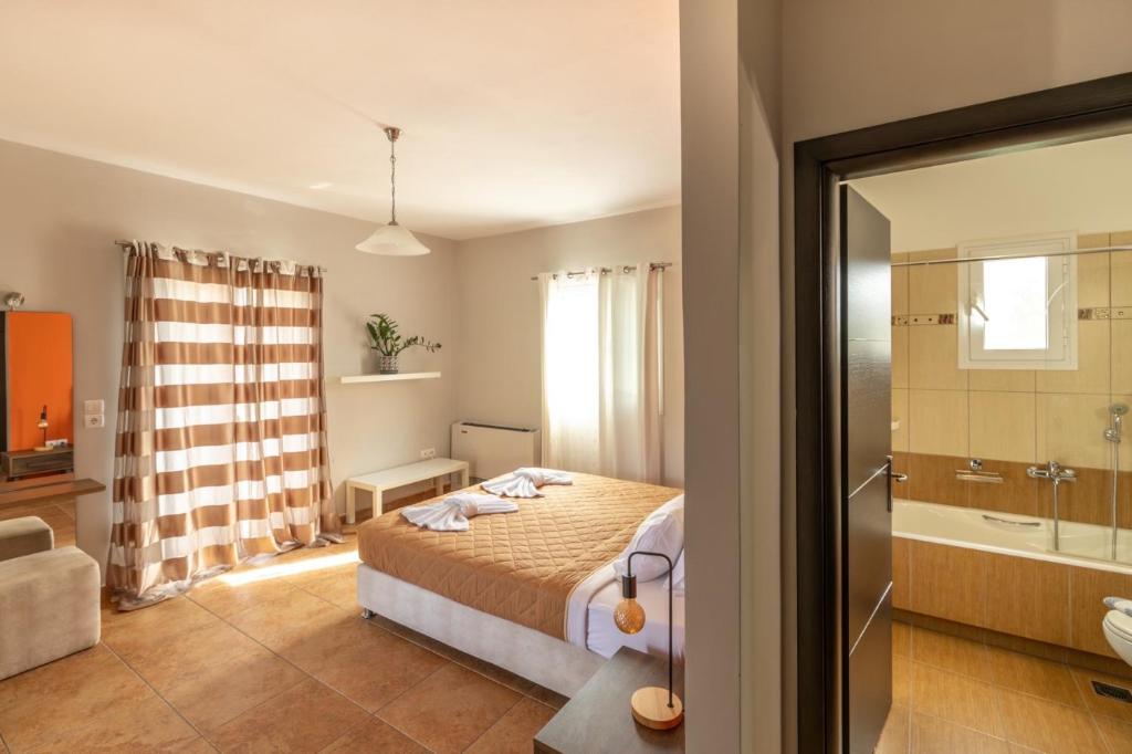 Postel nebo postele na pokoji v ubytování "Villa ANDREAS"