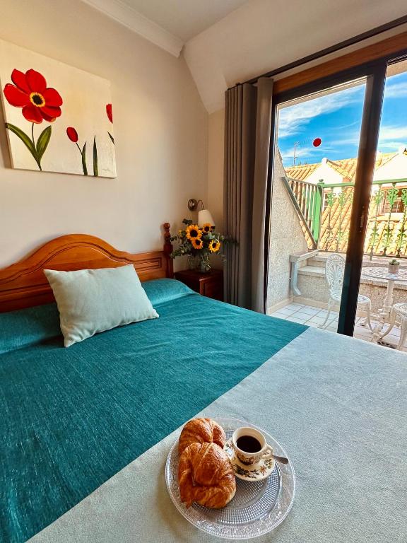 Postel nebo postele na pokoji v ubytování Hotel Reyesol