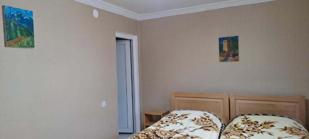 Postel nebo postele na pokoji v ubytování Guesthouse Robi