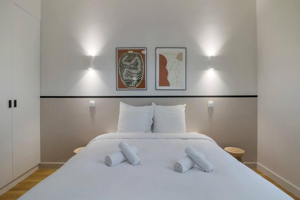 Katil atau katil-katil dalam bilik di Appart 6Pers#2Bedrooms#Victor Hugo#Arc de Triomphe