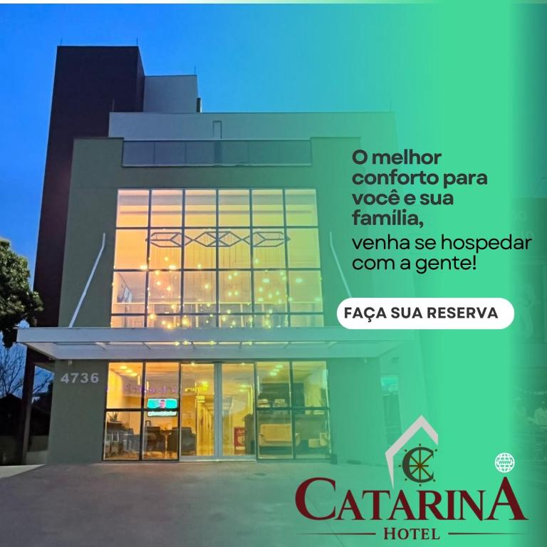 a building with a sign in front of it at Hotel Catarina in São Miguel dʼOeste