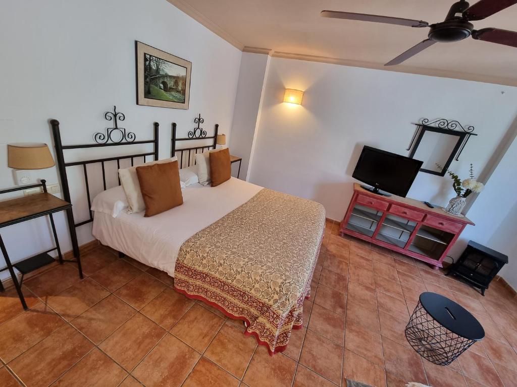 Posteľ alebo postele v izbe v ubytovaní Hotel Rural Alfajía de Antonio