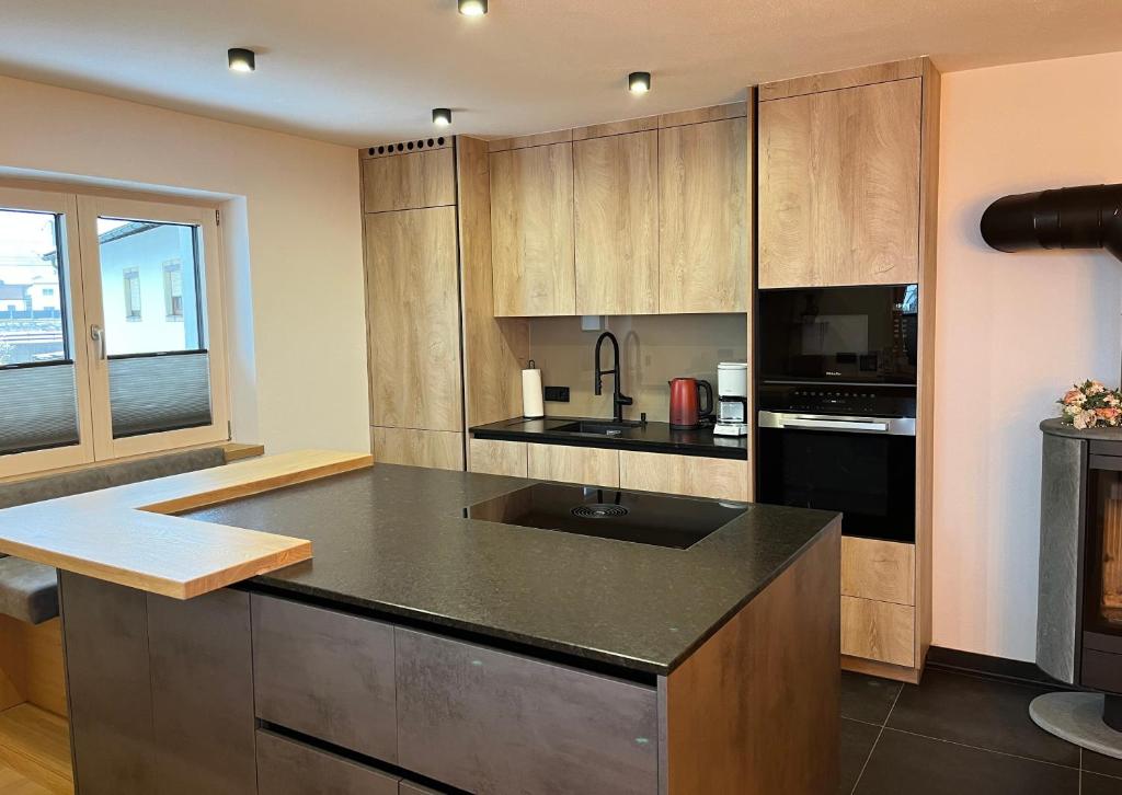 Kuchyň nebo kuchyňský kout v ubytování Apartment Steffi