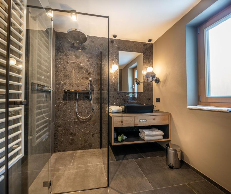 Koupelna v ubytování Hotel Cristallo - Wellness Mountain Living