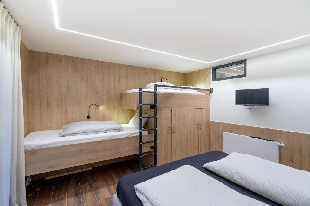 Postel nebo postele na pokoji v ubytování Gîte DDS