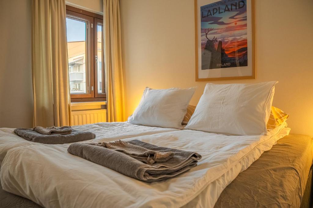 Postel nebo postele na pokoji v ubytování Arctic City Base: 2-room Cozy Apartment