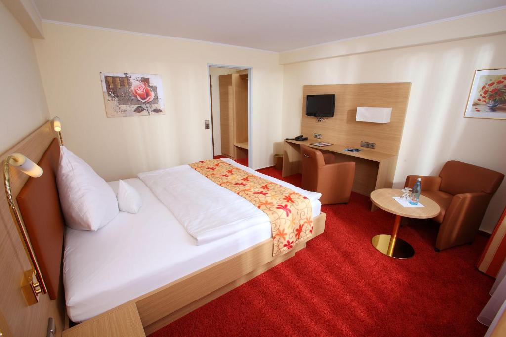 Postel nebo postele na pokoji v ubytování Hotel Schwanen