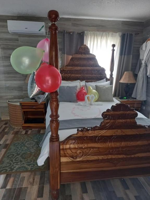 Postel nebo postele na pokoji v ubytování Windbreak Villa