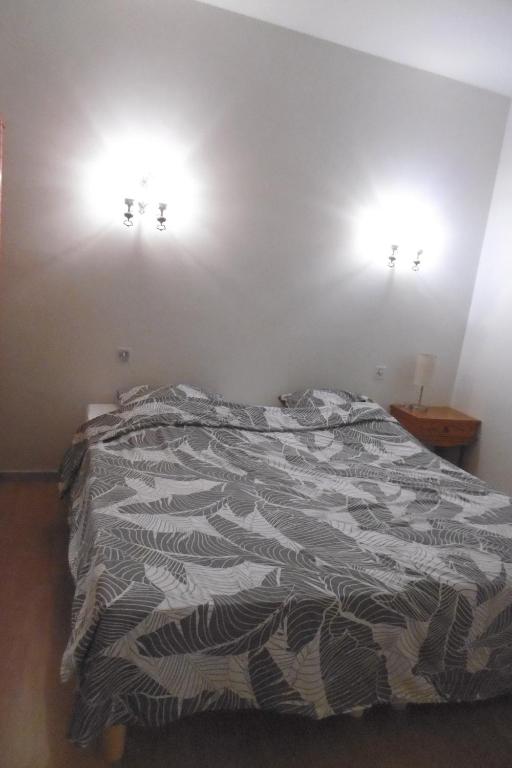 Postel nebo postele na pokoji v ubytování Gîte Le Lot