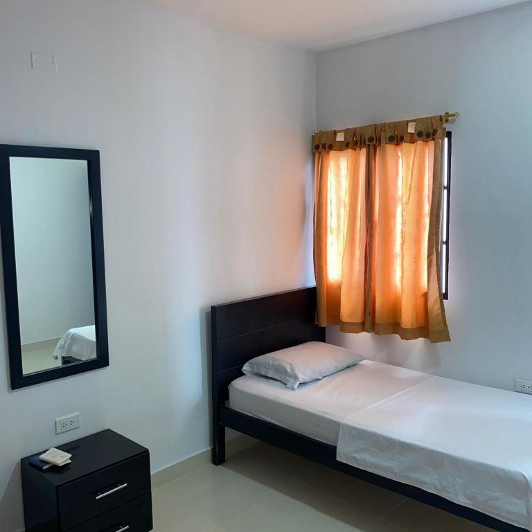 Postel nebo postele na pokoji v ubytování HOTEL LUZ MERY