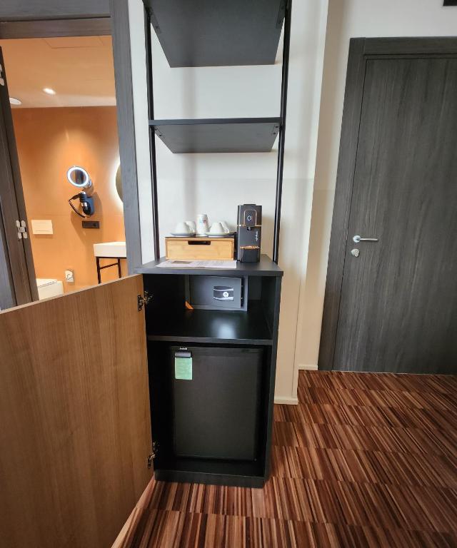 Kuchyň nebo kuchyňský kout v ubytování Bleis Hotel