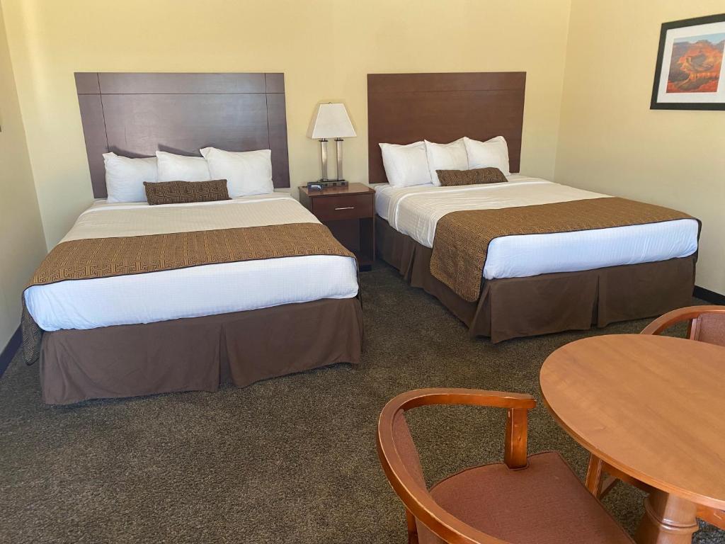 Postel nebo postele na pokoji v ubytování Southern Inns And Suites now offering RV Spaces for rent