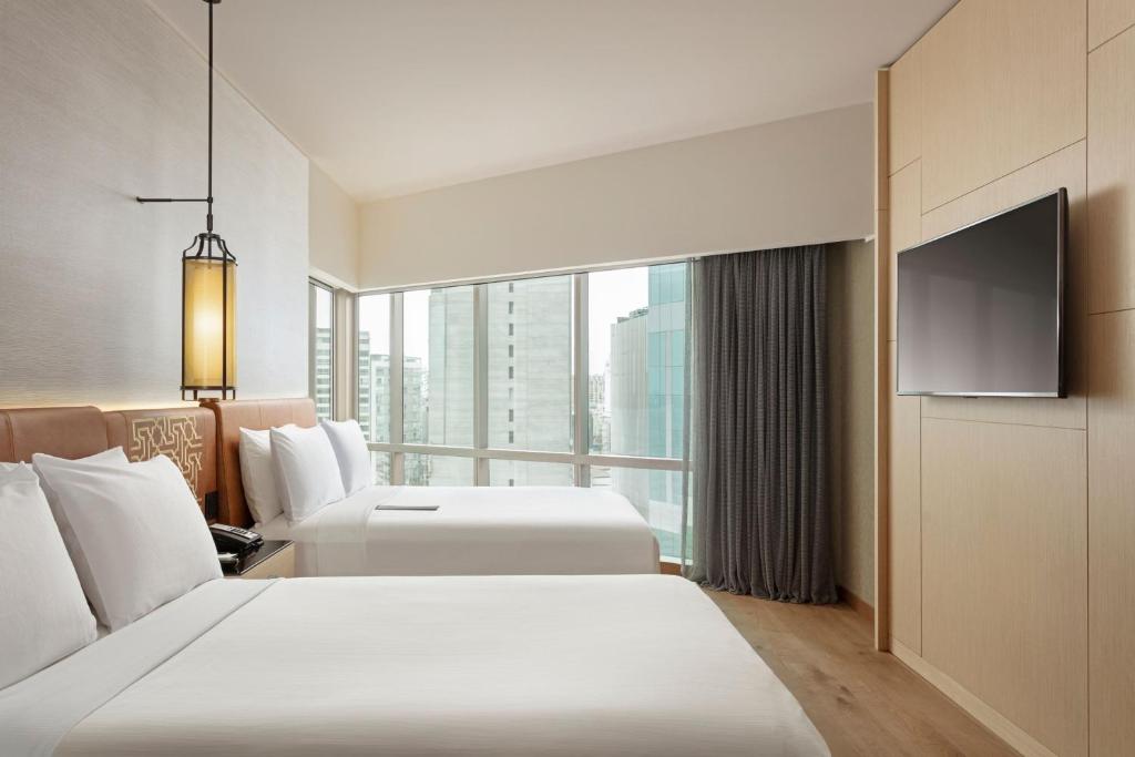 Ein Bett oder Betten in einem Zimmer der Unterkunft JW Marriott Hotel Lima