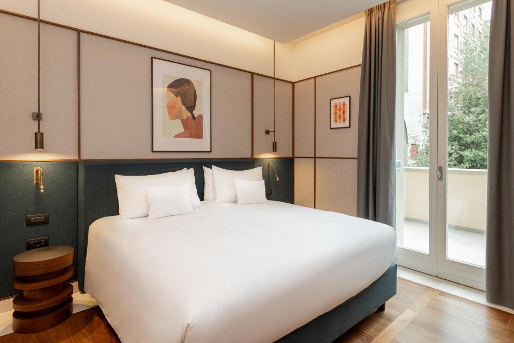 Postel nebo postele na pokoji v ubytování Hotel Brun