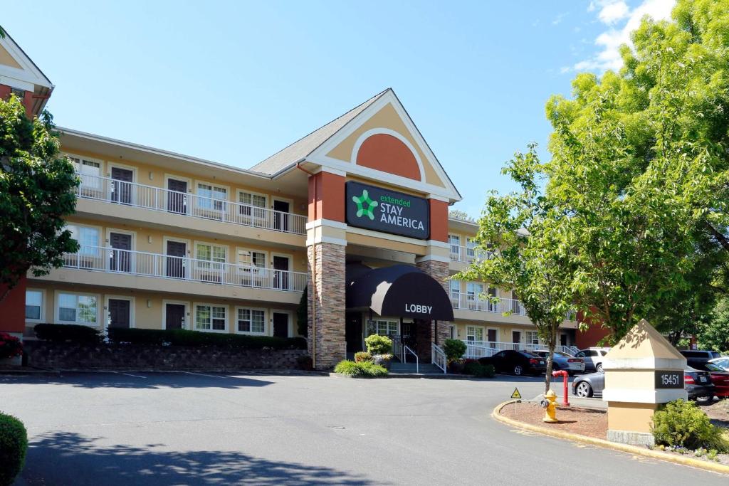 a hotel with a parking lot in front of it at Extended Stay America Suites - Seattle - Tukwila in Tukwila