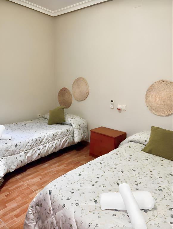 Postel nebo postele na pokoji v ubytování Piso Centrico En Linares