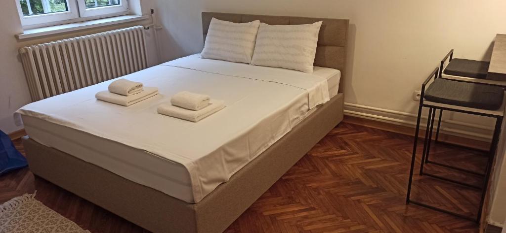 Кровать или кровати в номере Apartman 29