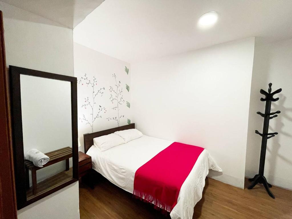 Postel nebo postele na pokoji v ubytování Casa Justina