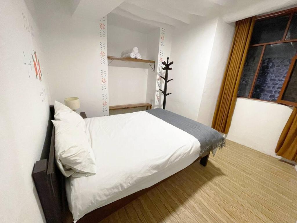 Postel nebo postele na pokoji v ubytování Casa Justina