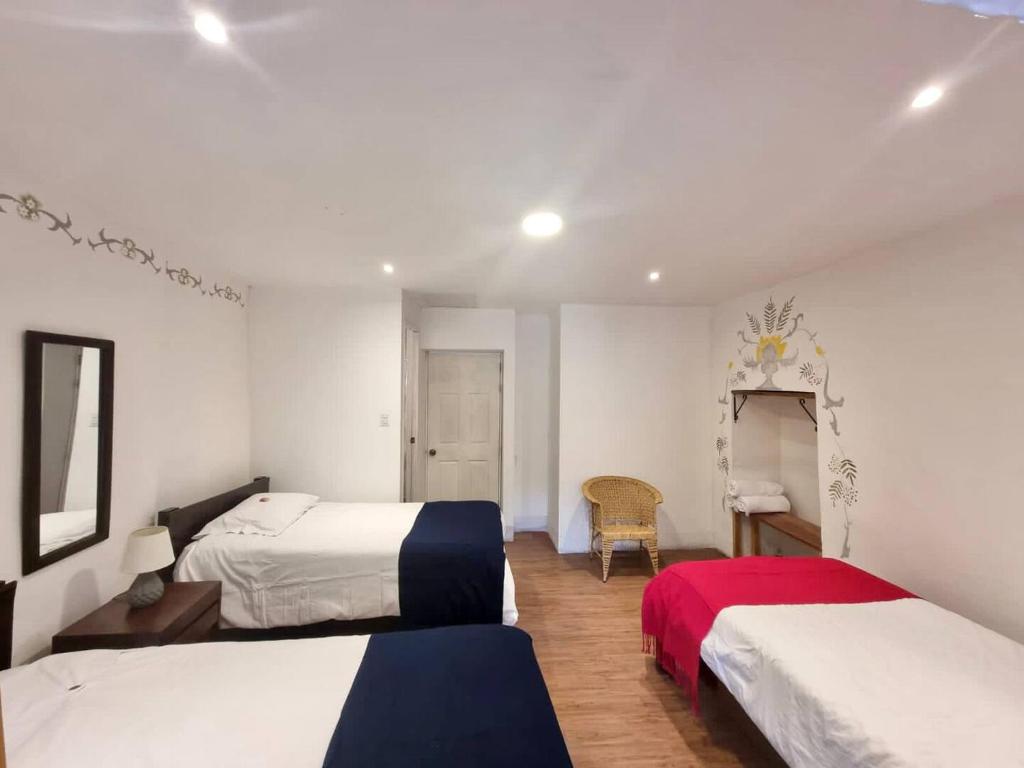 Postel nebo postele na pokoji v ubytování Casa Justina