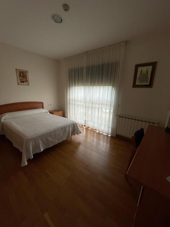 Posteľ alebo postele v izbe v ubytovaní Casa Diocesana VIA LUCIS